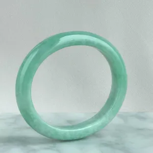 81752 52.5mm Apple Green Oval Jadeite Bangle