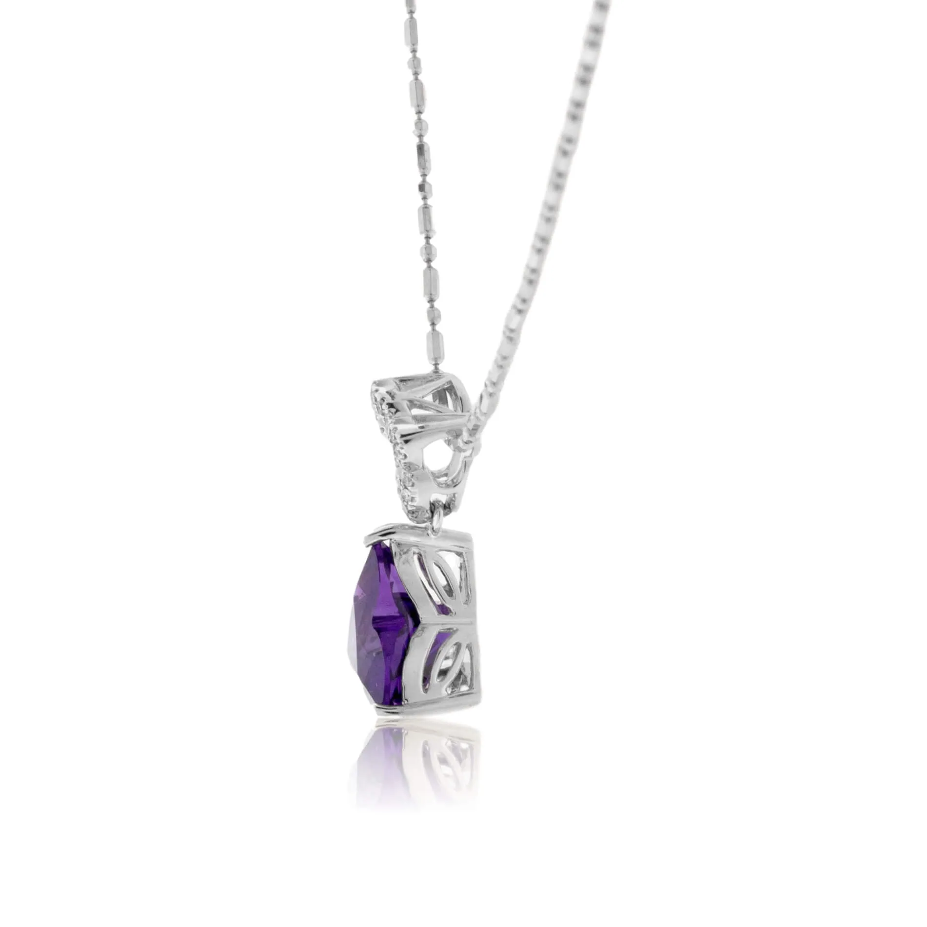 Carved Amethyst and Diamond Pendant