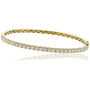 DIAMOND HALF SET BANGLE IN 18K YELLOW GOLD