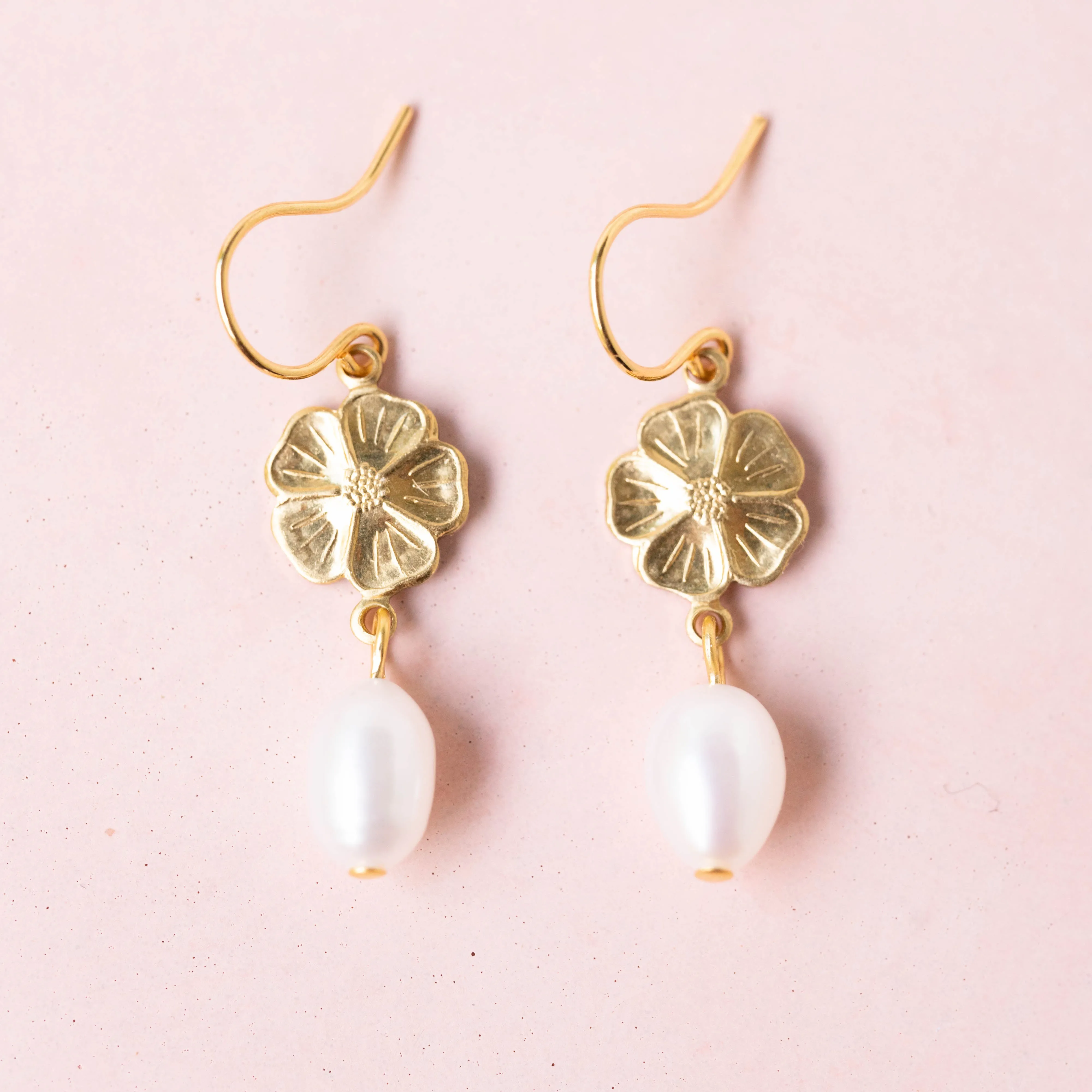 Flower and dangle earrings