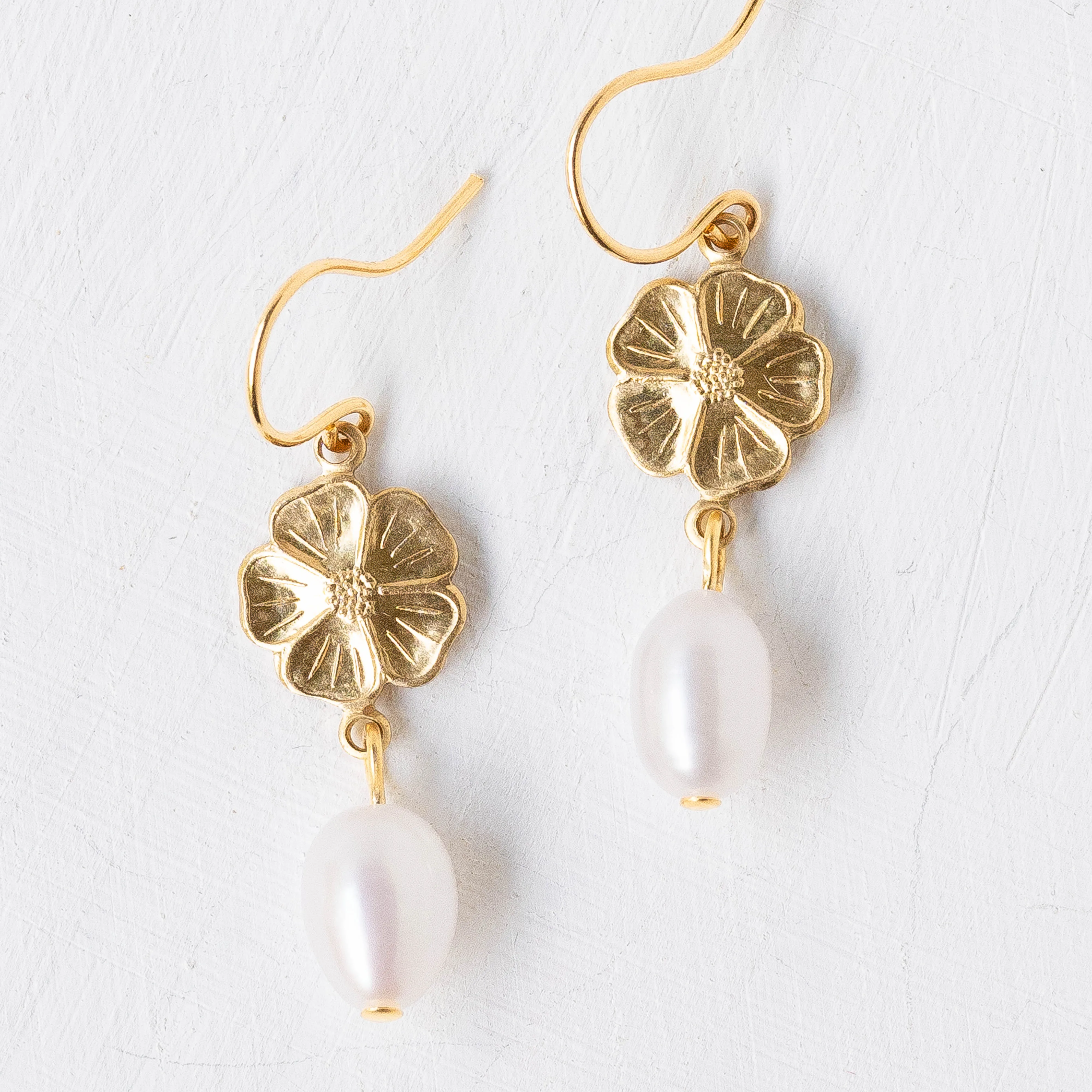 Flower and dangle earrings