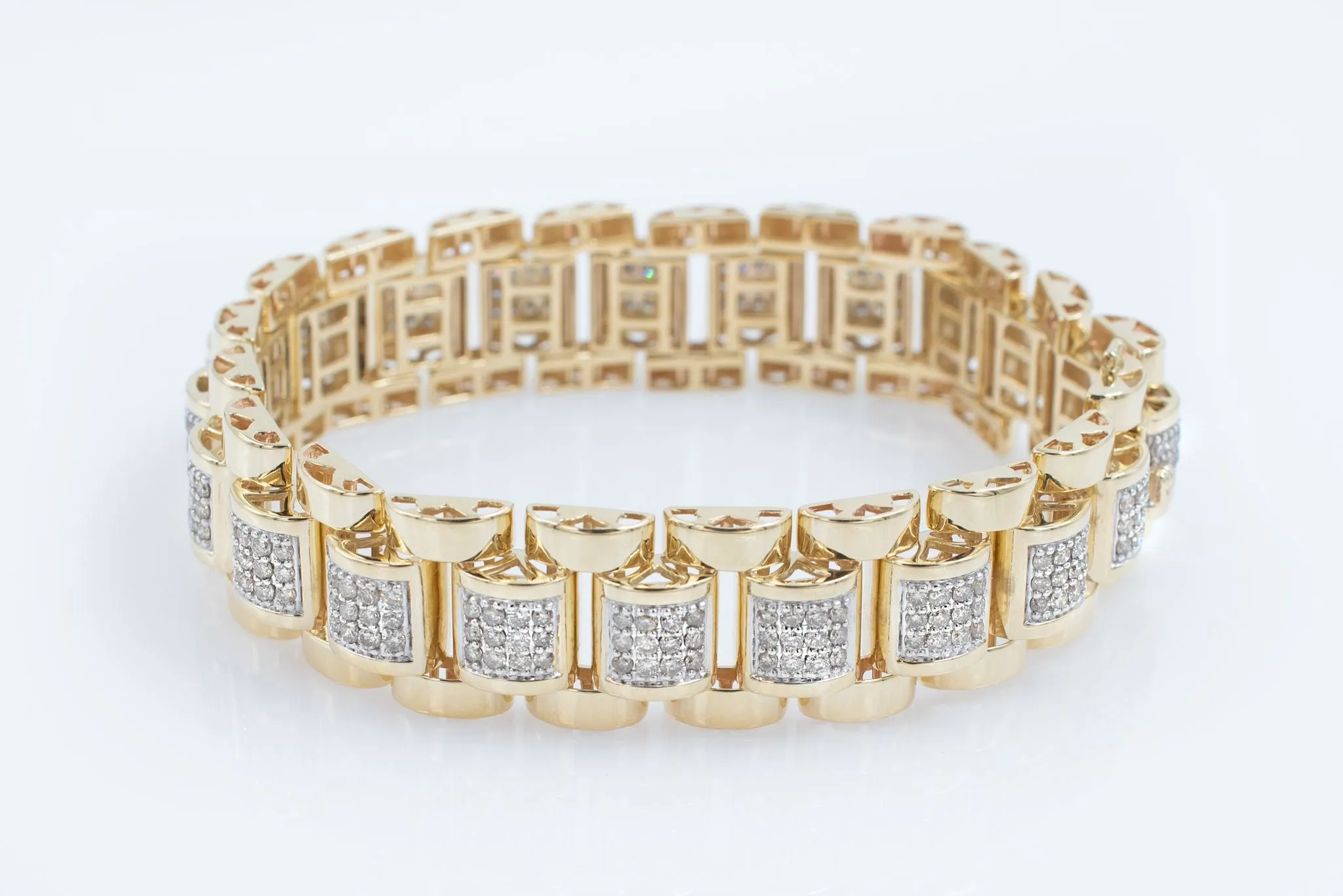 Men's 10K gold hatch style bracelet.