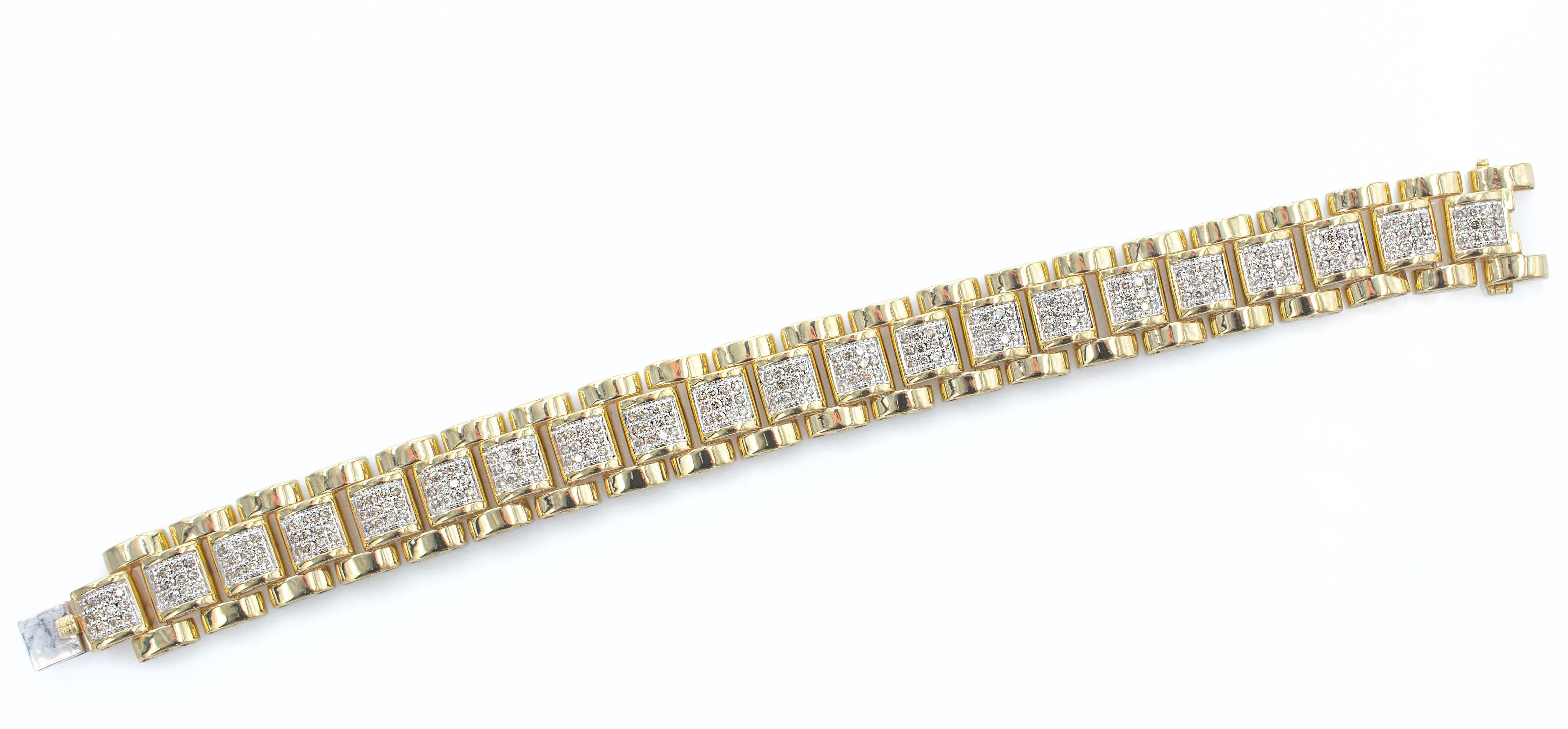 Men's 10K gold hatch style bracelet.