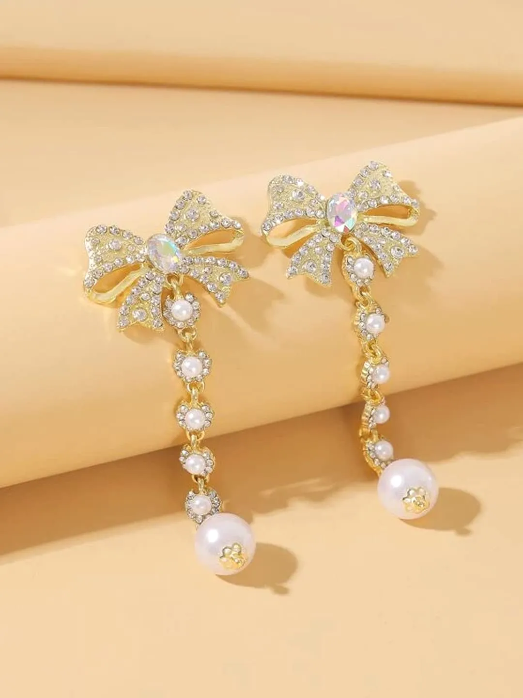 Yellow Chimes Earrings for Women and Girls Fashion White Pearl Dangler | Gold Plated Bow Knot Hanging Pearl Dangler Earrings | Birthday Gift for Girls & Women Anniversary Gift for Wife